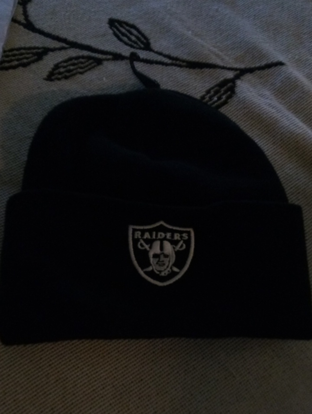 Black Cuffed Beanie with Raiders Patch